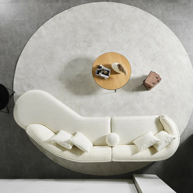 Il Serpente Bianco – Canapé Courbe en Bouclé Japandi